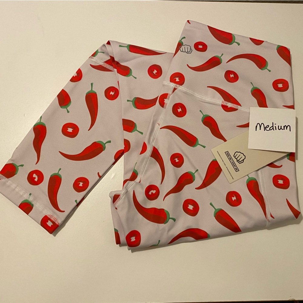 Feed Me Fight Me leggings - Med - NWT peppers